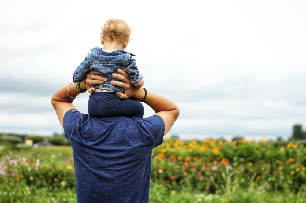 Father with son on his shoulders